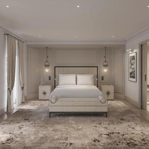 a bedroom with a bed and two night stands at Grand Hotel Ampezzo in Cortina dʼAmpezzo +38 photos