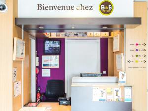 TV a/nebo společenská místnost v ubytování B&B HOTEL Toulouse Basso Cambo