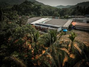 an overhead view of a building with palm trees at The Nap Koh Yao Yai in Ban Nai Wat