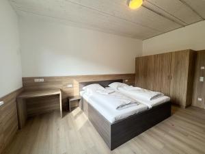 a bedroom with two beds in a room at A2 Hotel Memmingen - SELF-CHECK-IN in Memmingen