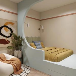 a bedroom with a bed with a mirror on the wall at GÓC MƠ home in Da Thanh +6 photos