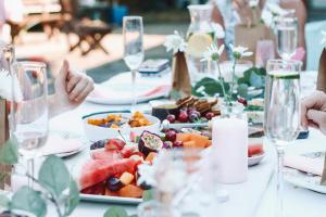 a table with a plate of food on it at Hotel Allegade 10 in Copenhagen