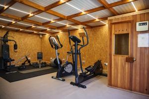 a gym with several exercise bikes in a room at Hotel Tossal d'Altea in Altea