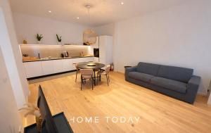 a living room with a couch and a table at HT - Luxury suite in Piazza del Santo in Padova