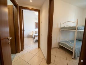 a hallway with a room with a bunk bed at TRIESTE - Premium Villas in Giulianova