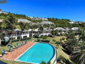 an aerial view of a resort with a swimming pool at Breathtaking Views Private 1 Bed Villa in Freetown Village