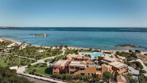 an aerial view of a resort near the ocean at Sirens Beach & Village in Malia