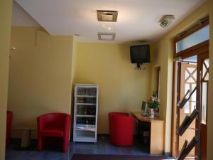 TV i/ili multimedijalni sistem u objektu Hotel Garni Höchschmied