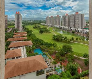an aerial view of a city with tall buildings at Skyline Serenia 23rd floor in Dehu Road