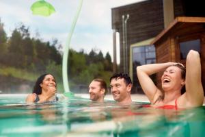 a group of people in a swimming pool at Center Parcs Bostalsee Saarland in Nohfelden