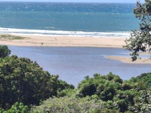 a view of a beach from a bluff at Villa Ti Amo Flat in Ramsgate