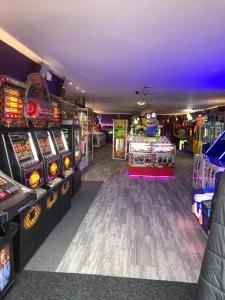 a room filled with lots of video games at Field View 162a fifth Ave in Bridlington