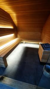 a room with a sauna with a bed in it at Azur en Ardenne in Durbuy
