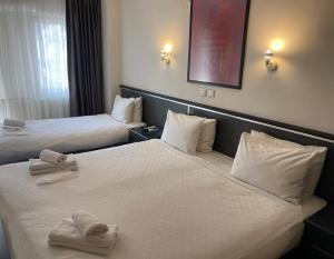 Posteľ alebo postele v izbe v ubytovaní Hotel Balca