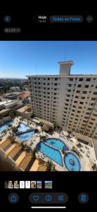 a picture of a hotel with a view of a building at Boulevard suite hotel apartamento 434 in Caldas Novas