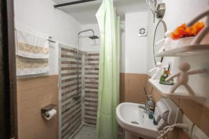 a bathroom with a shower and a sink and a shower at Guest House Jnan Sbil in Fez +93 photos