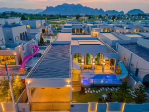 an aerial view of a building with a playground at CC POOL VILLA พลูวิลล่าcha-am in Cha Am