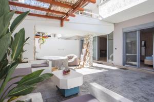 a living room with a couch and a table at Casa Gemma 3 in Rhodes Town