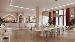 a restaurant with tables and chairs and a counter at Sinnada Resort & Thermaland in Afyon