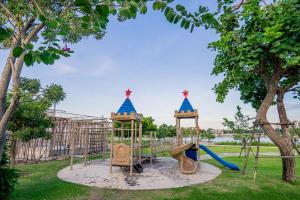 a park with a playground with a slide at CC POOL VILLA พลูวิลล่าcha-am in Cha Am