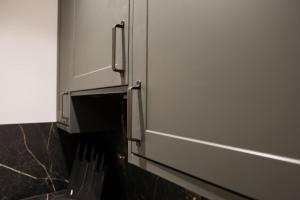 a door of a kitchen with some knives at Lovely Studio Flat on Bath Road - Flat 2 in Bristol +25 photos