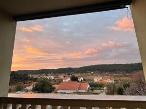 a view from a window of a town at Studio Luxe in Kampor +2 photos