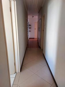 an empty hallway with a corridorngthngthngthngthngthngthngthngthngthngth at Mestil Guesthouse in Hoheizen