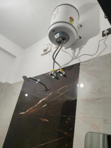 a security camera on the ceiling of a room at Nanda devi hotel in Mussoorie
