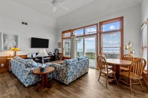 a living room with a couch and a table at 7865 - Peridot in Frisco