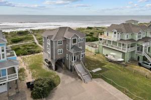 an aerial view of a house and the ocean at 7865 - Peridot in Frisco