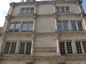a building with a sign on the front of it at Le BALCON DU PRINCE in Montbéliard