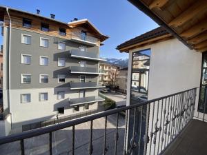 a view from the balcony of a building at My Sweet Home In The Dolomites - Casa LaLu in Cavalese