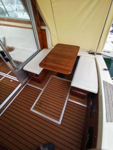 a small table in the back of a boat at Jeddah in Izola