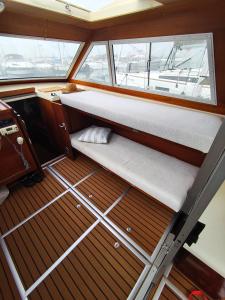 an interior of a boat with two bunk beds at Jeddah in Izola