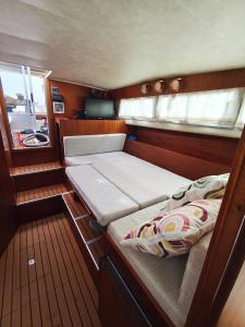 a small bed in the back of a boat at Jeddah in Izola