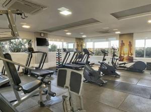 a gym with a bunch of exercise equipment in a room at Prime Stay 2102 in Guarulhos