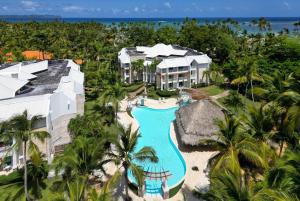an aerial view of a resort with a swimming pool at Wyndham Alltra Samana All Inclusive Resort in Las Galeras