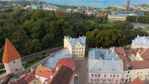 an aerial view of a town with a castle at Rija Old Town Hotel in Tallinn +23 photos