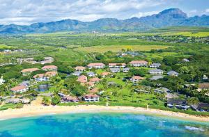 an aerial view of a resort on a beach at Kiahuna Plantation Resort Kauai by OUTRIGGER in Koloa