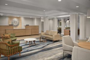 a lobby with couches and chairs and a table at Fairfield Inn & Suites El Centro in El Centro