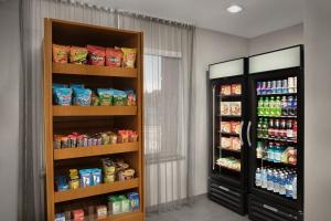a room with a refrigerator and shelves with food at Fairfield Inn & Suites El Centro in El Centro +54 photos