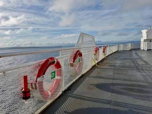 a row of tennis rackets on a pier at Island Coastal Retreat in Nanaimo