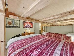 a bedroom with two beds in a room at Giant Steps 12 Rustic Retreat ski in out in Brian Head +65 photos