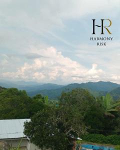 a view of the mountains from the top of a house at Harmony Risk in Albán