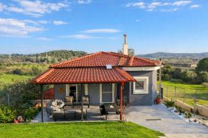 a small house with an orange roof at Sountou home in Xanthi
