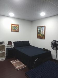 a bedroom with a bed in a room at Traum House in Saint Augustine