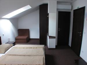Postel nebo postele na pokoji v ubytování Rooms Levicki