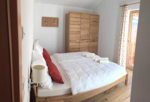 Łóżko lub łóżka w pokoju w obiekcie Chalet Noriker