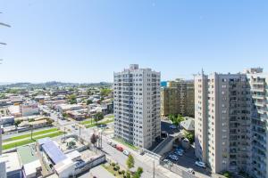 an aerial view of a city with tall buildings at Alta vista Concepción in Concepción