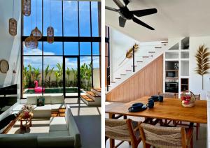 a living room and dining room with a dining table at Surya Palm Villa in Tumbak Bayuh